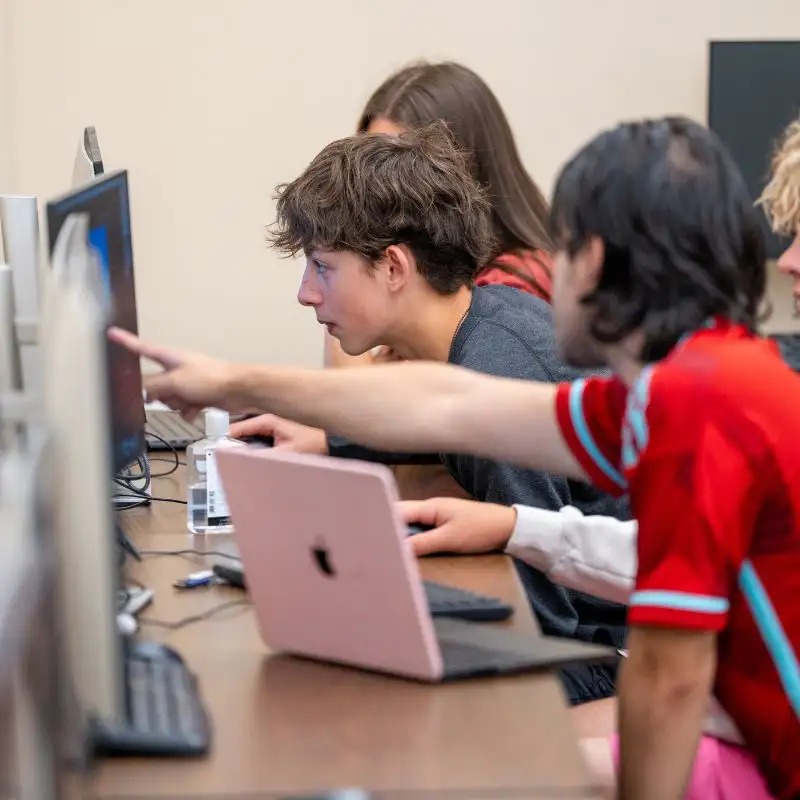 Students working together in a computer lab.