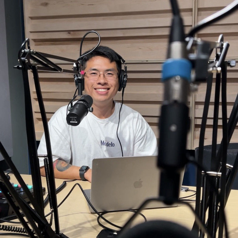 Isaac Wetzel recording a podcast in studio.