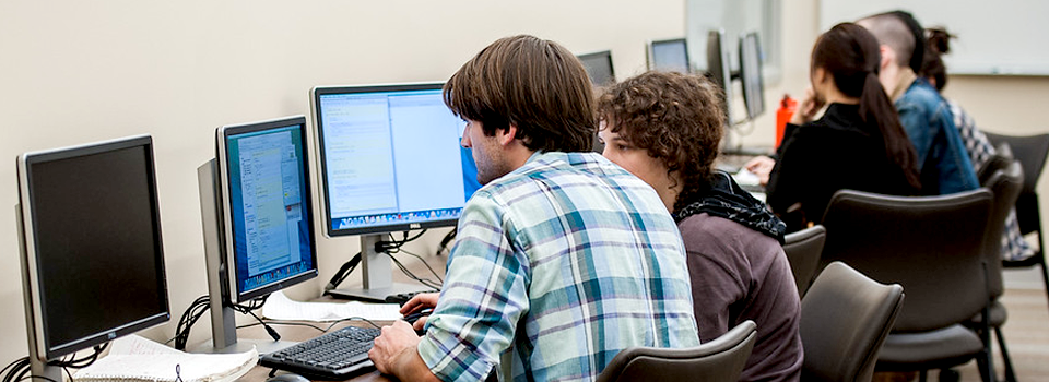ITS Header Image = Student in Computer Lab