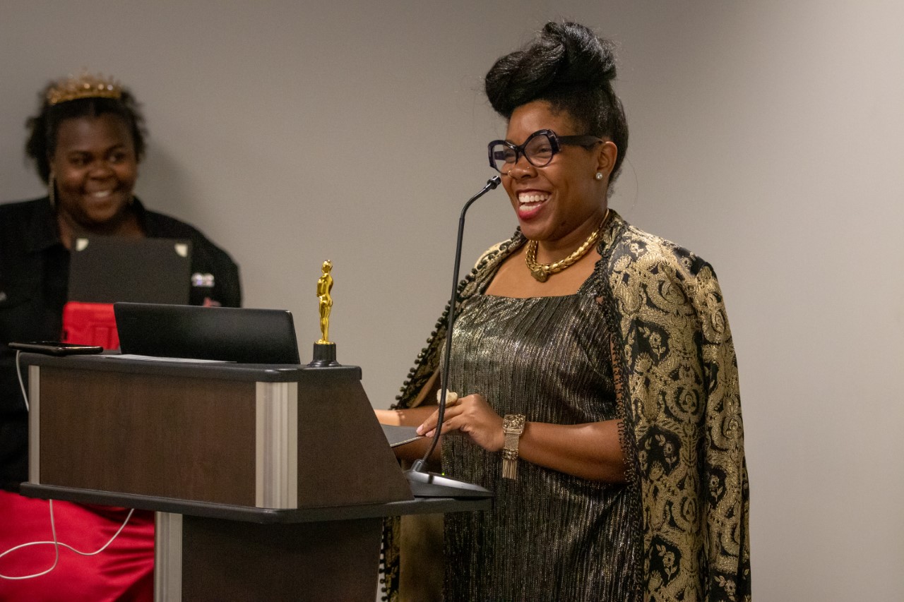 Kia speaking to the audience