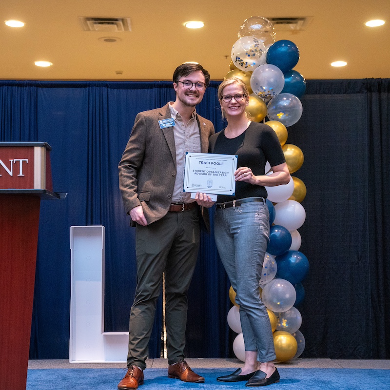 Two faculty pose with the Student Organization Advisor of the Year