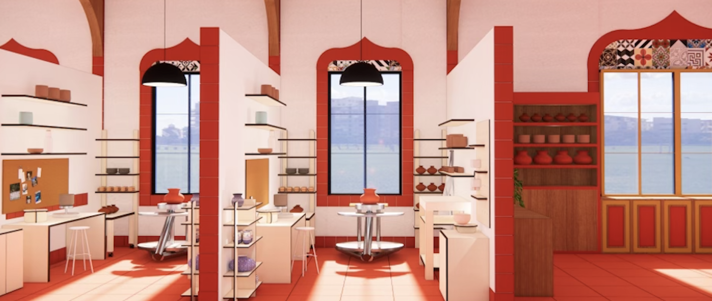 Moore's design: A well-lit pottery studio with warm red and cream tones, featuring arched windows with decorative tile details. The space is divided into individual workstations with shelves displaying ceramic pieces, pottery wheels, and worktables. Pendant lights hang from the ceiling, and a large wooden shelf holds rows of red clay pots. The windows reveal a scenic outdoor view of a body of water and distant buildings